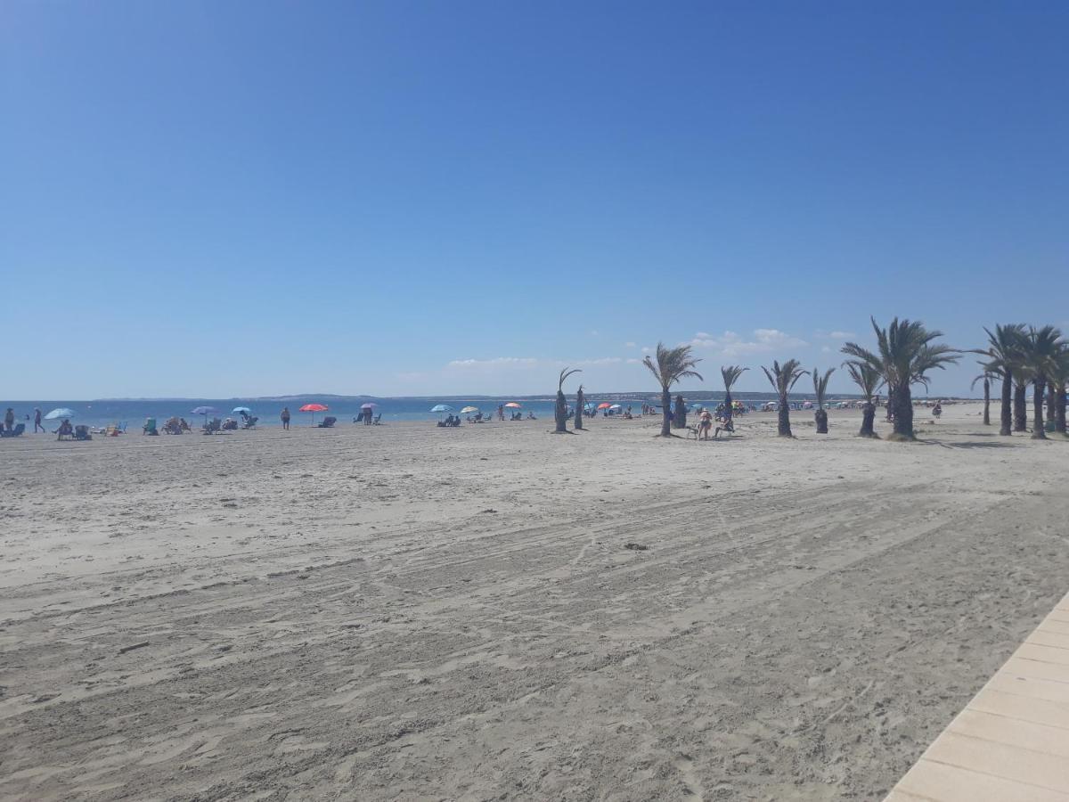 Apartamento Santa Pola, En Playa Del Tamarit Con Piscina. Bagian luar foto